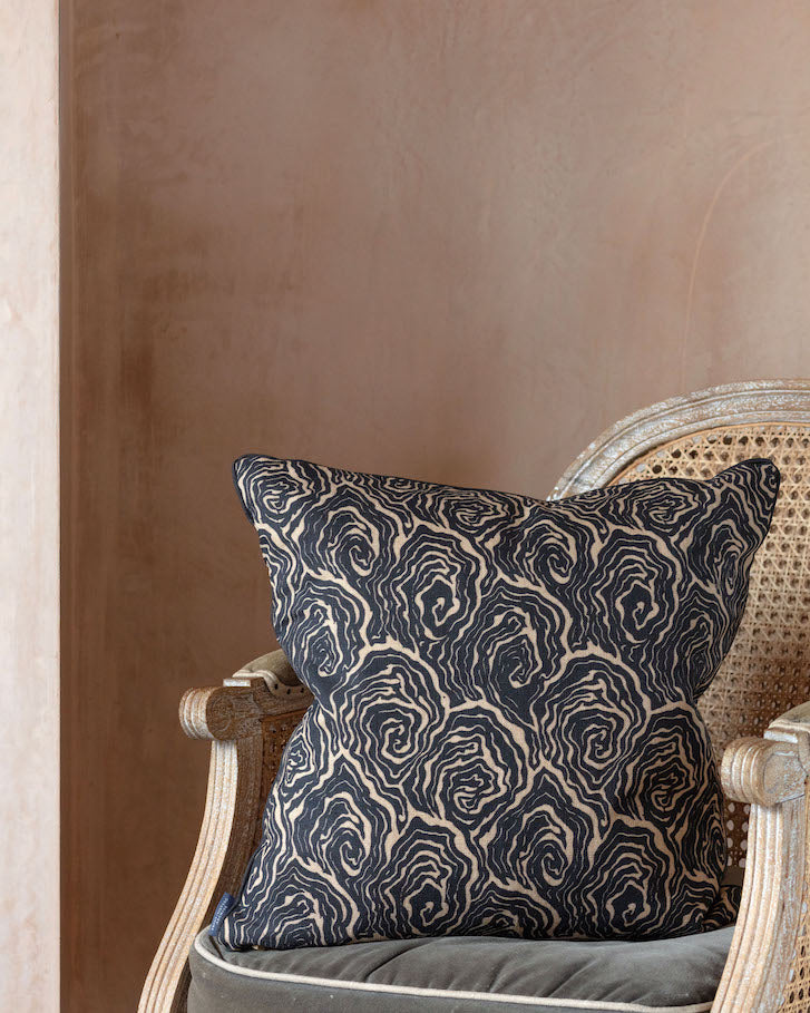 oysters linen cushion in the colour monochrome