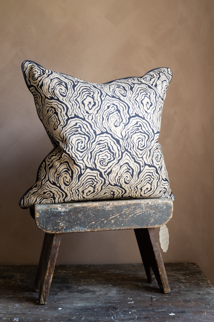 oysters linen cushion in the colour monochrome