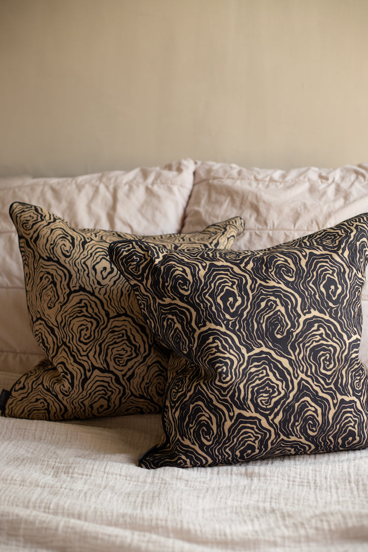 oysters linen cushion in the colour monochrome