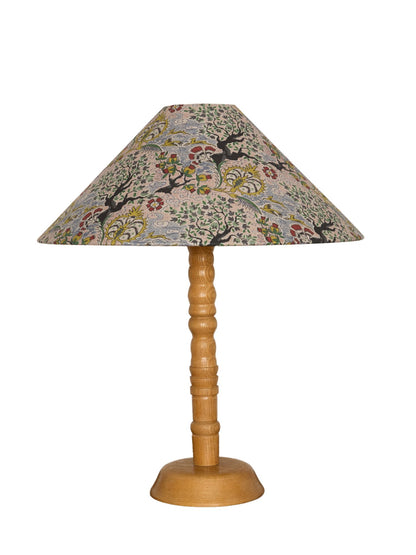 Table lamp with a decorative lampshade on a white background
